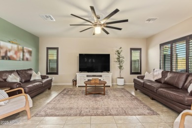 Welcome to your dream home, nestled in a vibrant neighborhood on Poston Butte Golf Club in Arizona - for sale on GolfHomes.com, golf home, golf lot