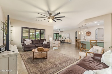 Welcome to your dream home, nestled in a vibrant neighborhood on Poston Butte Golf Club in Arizona - for sale on GolfHomes.com, golf home, golf lot