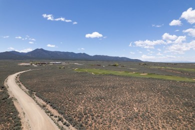 This is a stunning lot with views and privacy on the 8th Fairway on Taos Country Club in New Mexico - for sale on GolfHomes.com, golf home, golf lot