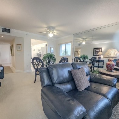 Spacious, sunlit 2-bed, 2-bath corner condo in the sought-after on Flamingo Lakes Country Club in Florida - for sale on GolfHomes.com, golf home, golf lot