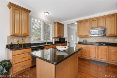 Welcome to 5504 Eagleview Court! This end-unit ranch condo is on Pine Knob Golf Club - Hawk in Michigan - for sale on GolfHomes.com, golf home, golf lot