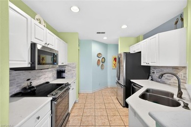 Enjoy peaceful Southwest Florida living in this first-floor on Pelican Sound Golf and River Club in Florida - for sale on GolfHomes.com, golf home, golf lot