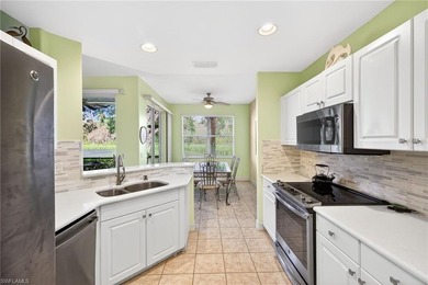 Enjoy peaceful Southwest Florida living in this first-floor on Pelican Sound Golf and River Club in Florida - for sale on GolfHomes.com, golf home, golf lot