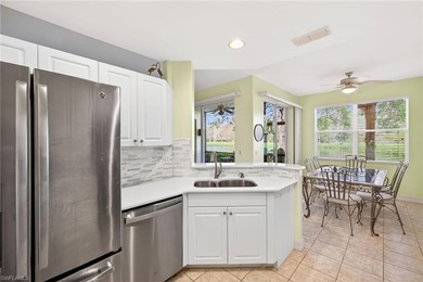 Enjoy peaceful Southwest Florida living in this first-floor on Pelican Sound Golf and River Club in Florida - for sale on GolfHomes.com, golf home, golf lot