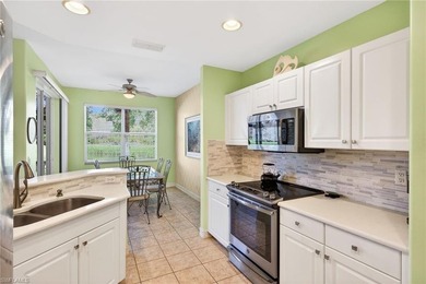 Enjoy peaceful Southwest Florida living in this first-floor on Pelican Sound Golf and River Club in Florida - for sale on GolfHomes.com, golf home, golf lot