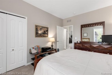 Welcome to 5504 Eagleview Court! This end-unit ranch condo is on Pine Knob Golf Club - Hawk in Michigan - for sale on GolfHomes.com, golf home, golf lot