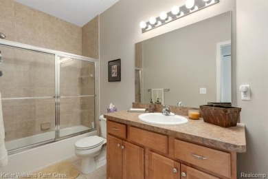 Welcome to 5504 Eagleview Court! This end-unit ranch condo is on Pine Knob Golf Club - Hawk in Michigan - for sale on GolfHomes.com, golf home, golf lot