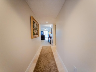 Spacious, sunlit 2-bed, 2-bath corner condo in the sought-after on Flamingo Lakes Country Club in Florida - for sale on GolfHomes.com, golf home, golf lot