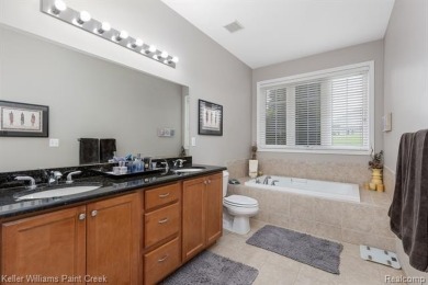 Welcome to 5504 Eagleview Court! This end-unit ranch condo is on Pine Knob Golf Club - Hawk in Michigan - for sale on GolfHomes.com, golf home, golf lot