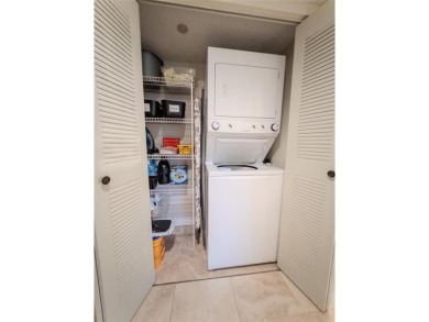 Spacious, sunlit 2-bed, 2-bath corner condo in the sought-after on Flamingo Lakes Country Club in Florida - for sale on GolfHomes.com, golf home, golf lot