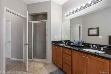 Welcome to 5504 Eagleview Court! This end-unit ranch condo is on Pine Knob Golf Club - Hawk in Michigan - for sale on GolfHomes.com, golf home, golf lot