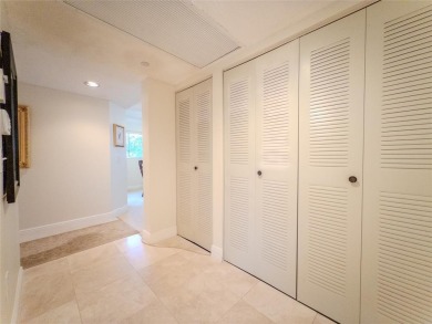 Spacious, sunlit 2-bed, 2-bath corner condo in the sought-after on Flamingo Lakes Country Club in Florida - for sale on GolfHomes.com, golf home, golf lot