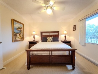 Spacious, sunlit 2-bed, 2-bath corner condo in the sought-after on Flamingo Lakes Country Club in Florida - for sale on GolfHomes.com, golf home, golf lot