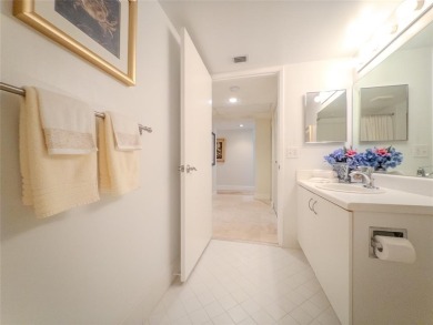 Spacious, sunlit 2-bed, 2-bath corner condo in the sought-after on Flamingo Lakes Country Club in Florida - for sale on GolfHomes.com, golf home, golf lot