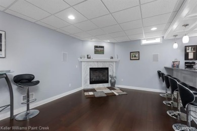 Welcome to 5504 Eagleview Court! This end-unit ranch condo is on Pine Knob Golf Club - Hawk in Michigan - for sale on GolfHomes.com, golf home, golf lot