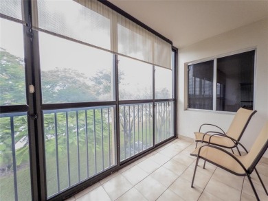 Spacious, sunlit 2-bed, 2-bath corner condo in the sought-after on Flamingo Lakes Country Club in Florida - for sale on GolfHomes.com, golf home, golf lot