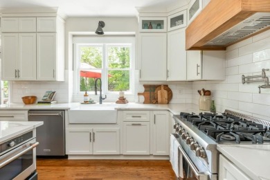 Tucked in a quiet cul-de-sac, this beautifully updated 5 bedroom on Windermere Golf Club in Georgia - for sale on GolfHomes.com, golf home, golf lot