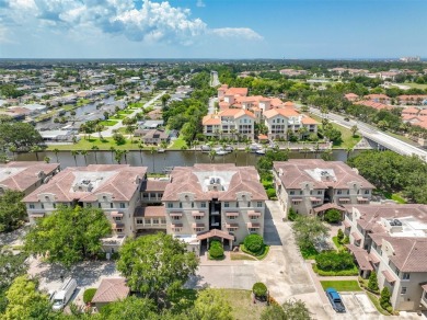 Condo living at its best!  This almost 2300 square ft condo with on Palm Harbor Golf Club in Florida - for sale on GolfHomes.com, golf home, golf lot
