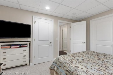 Welcome to 5504 Eagleview Court! This end-unit ranch condo is on Pine Knob Golf Club - Hawk in Michigan - for sale on GolfHomes.com, golf home, golf lot