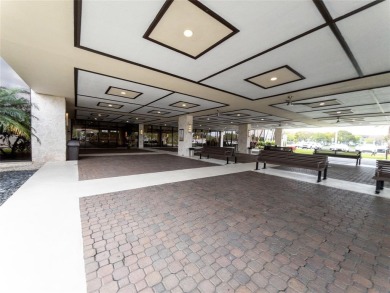Spacious, sunlit 2-bed, 2-bath corner condo in the sought-after on Flamingo Lakes Country Club in Florida - for sale on GolfHomes.com, golf home, golf lot