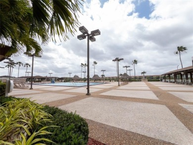 Spacious, sunlit 2-bed, 2-bath corner condo in the sought-after on Flamingo Lakes Country Club in Florida - for sale on GolfHomes.com, golf home, golf lot