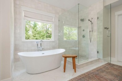 Tucked in a quiet cul-de-sac, this beautifully updated 5 bedroom on Windermere Golf Club in Georgia - for sale on GolfHomes.com, golf home, golf lot