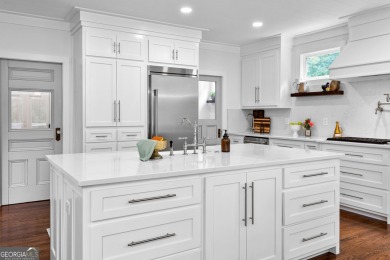 Exceptional 6-Bedroom, 5-Bath Luxury Home with Resort-Style on Whitewater Creek in Georgia - for sale on GolfHomes.com, golf home, golf lot