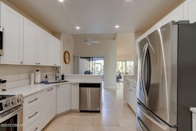 Come & tour this amazing 3 Bedroom 2 Bath, plus office, end unit on Spruce Creek Golf Club in Florida - for sale on GolfHomes.com, golf home, golf lot
