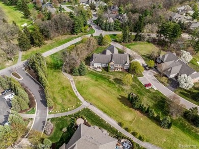 Welcome to 5504 Eagleview Court! This end-unit ranch condo is on Pine Knob Golf Club - Hawk in Michigan - for sale on GolfHomes.com, golf home, golf lot