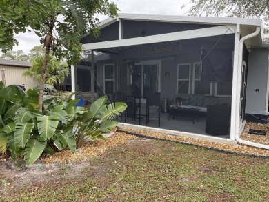 Location with stunning views of the golf course and waterpletely on Del Tura Golf and Country Club in Florida - for sale on GolfHomes.com, golf home, golf lot