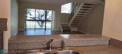 Hard to find lovely lake view townhome situated in one of the on Fontainebleau Golf Course in Florida - for sale on GolfHomes.com, golf home, golf lot