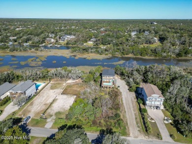 Marshfront lot with plenty of depth to build the home of your on Founders Club At St. James Plantation in North Carolina - for sale on GolfHomes.com, golf home, golf lot