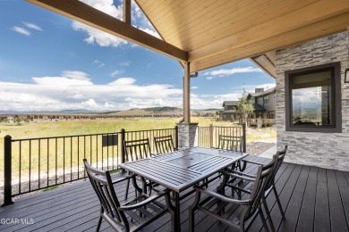 Watch video! This stunning 4-bedroom home is located on a corner on Grand Elk Ranch and Club in Colorado - for sale on GolfHomes.com, golf home, golf lot