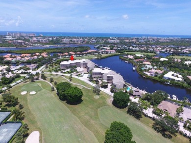 Waterfront 2BD/2BA condo in prestigious Jonathan's Landing with on Jonathans Landing Golf Club in Florida - for sale on GolfHomes.com, golf home, golf lot