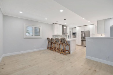 Waterfront 2BD/2BA condo in prestigious Jonathan's Landing with on Jonathans Landing Golf Club in Florida - for sale on GolfHomes.com, golf home, golf lot