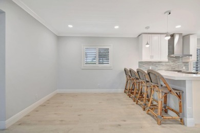 Waterfront 2BD/2BA condo in prestigious Jonathan's Landing with on Jonathans Landing Golf Club in Florida - for sale on GolfHomes.com, golf home, golf lot