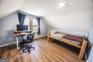 This updated 4-bedroom, 3-bath home is tucked into the Bent Tree on Bent Tree Golf Course in Georgia - for sale on GolfHomes.com, golf home, golf lot