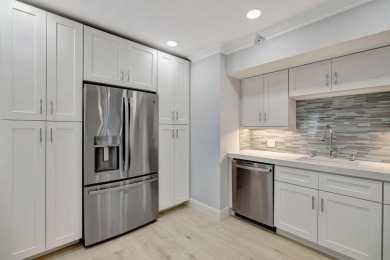 Waterfront 2BD/2BA condo in prestigious Jonathan's Landing with on Jonathans Landing Golf Club in Florida - for sale on GolfHomes.com, golf home, golf lot