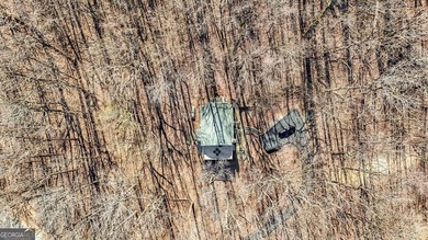 This updated 4-bedroom, 3-bath home is tucked into the Bent Tree on Bent Tree Golf Course in Georgia - for sale on GolfHomes.com, golf home, golf lot