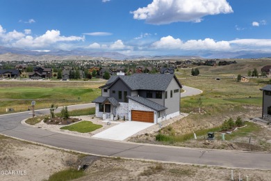 Watch video! This stunning 4-bedroom home is located on a corner on Grand Elk Ranch and Club in Colorado - for sale on GolfHomes.com, golf home, golf lot