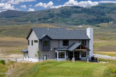 Watch video! This stunning 4-bedroom home is located on a corner on Grand Elk Ranch and Club in Colorado - for sale on GolfHomes.com, golf home, golf lot