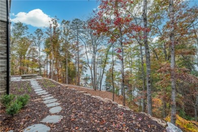 This newly constructed waterfront retreat, located in The on The Cliffs At Keowee Springs in South Carolina - for sale on GolfHomes.com, golf home, golf lot