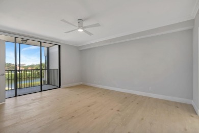 Waterfront 2BD/2BA condo in prestigious Jonathan's Landing with on Jonathans Landing Golf Club in Florida - for sale on GolfHomes.com, golf home, golf lot