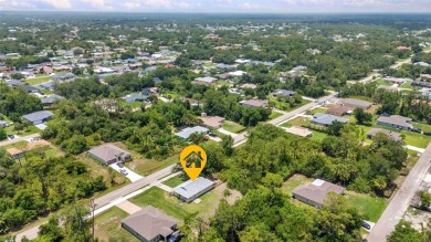 NO HOA - FENCED YARD - MINUTES TO CHARLOTTE HARBOR! This on Port Charlotte Golf Club in Florida - for sale on GolfHomes.com, golf home, golf lot