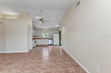 NO HOA - FENCED YARD - MINUTES TO CHARLOTTE HARBOR! This on Port Charlotte Golf Club in Florida - for sale on GolfHomes.com, golf home, golf lot
