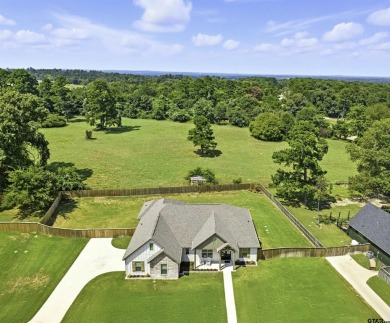 THIS GORGEOUS ONE-OWNER FAMILY HOME SITTING ON A HALF-ACRE LOT on Eagles Bluff Golf Course in Texas - for sale on GolfHomes.com, golf home, golf lot