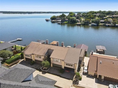 Check out this low-maintenance, waterfront townhome in the on De Cordova Bend Country Club in Texas - for sale on GolfHomes.com, golf home, golf lot