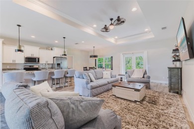 Experience the Best of Country Elegance and Modern Living in on Seminole Lakes Country Club in Florida - for sale on GolfHomes.com, golf home, golf lot