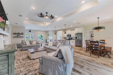 Experience the Best of Country Elegance and Modern Living in on Seminole Lakes Country Club in Florida - for sale on GolfHomes.com, golf home, golf lot
