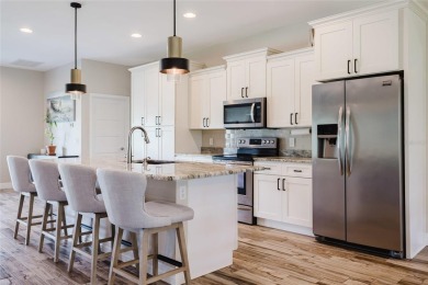 Experience the Best of Country Elegance and Modern Living in on Seminole Lakes Country Club in Florida - for sale on GolfHomes.com, golf home, golf lot